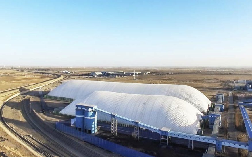 Bulk storage Domes served by conveyor and rail